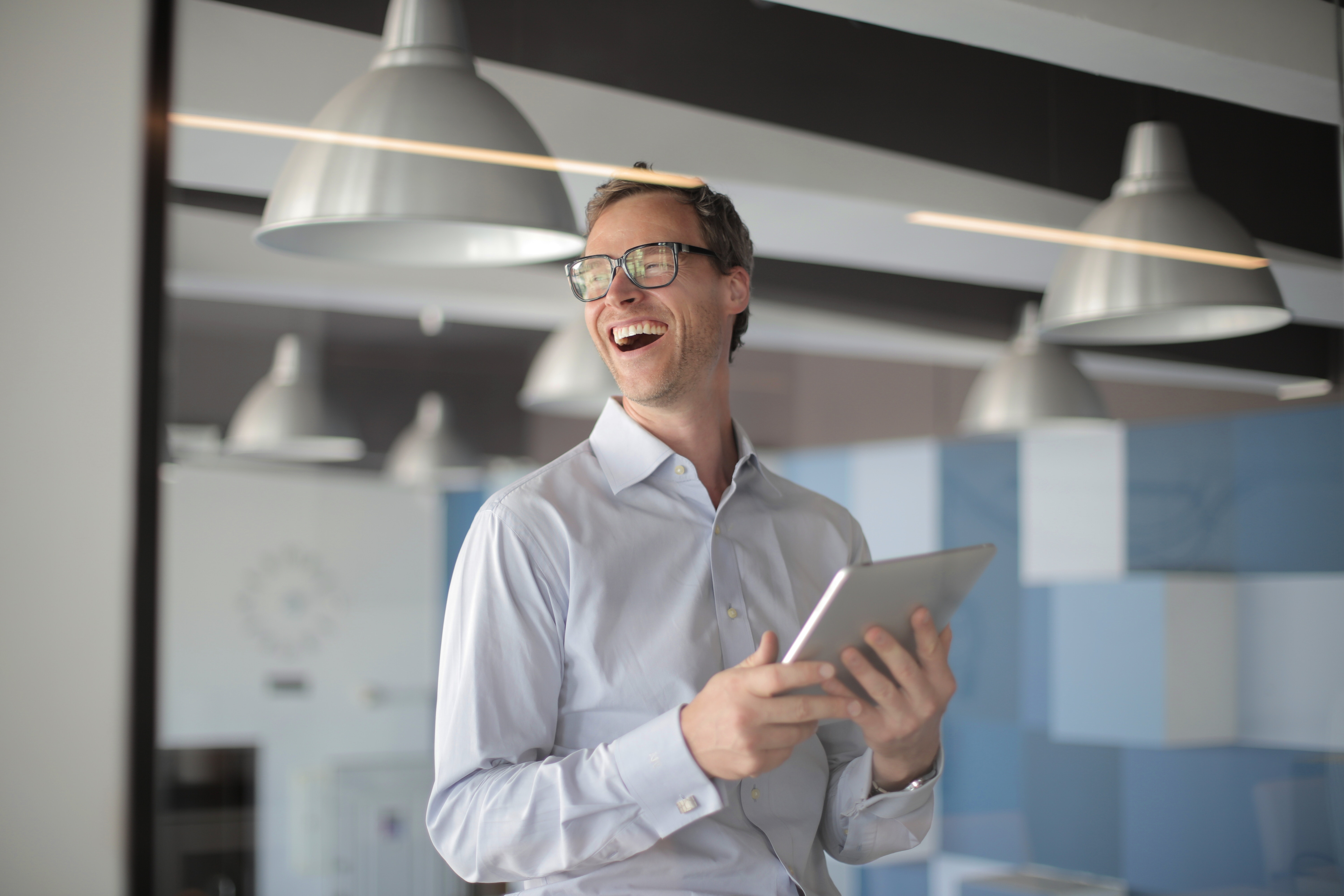 Laughing man in office