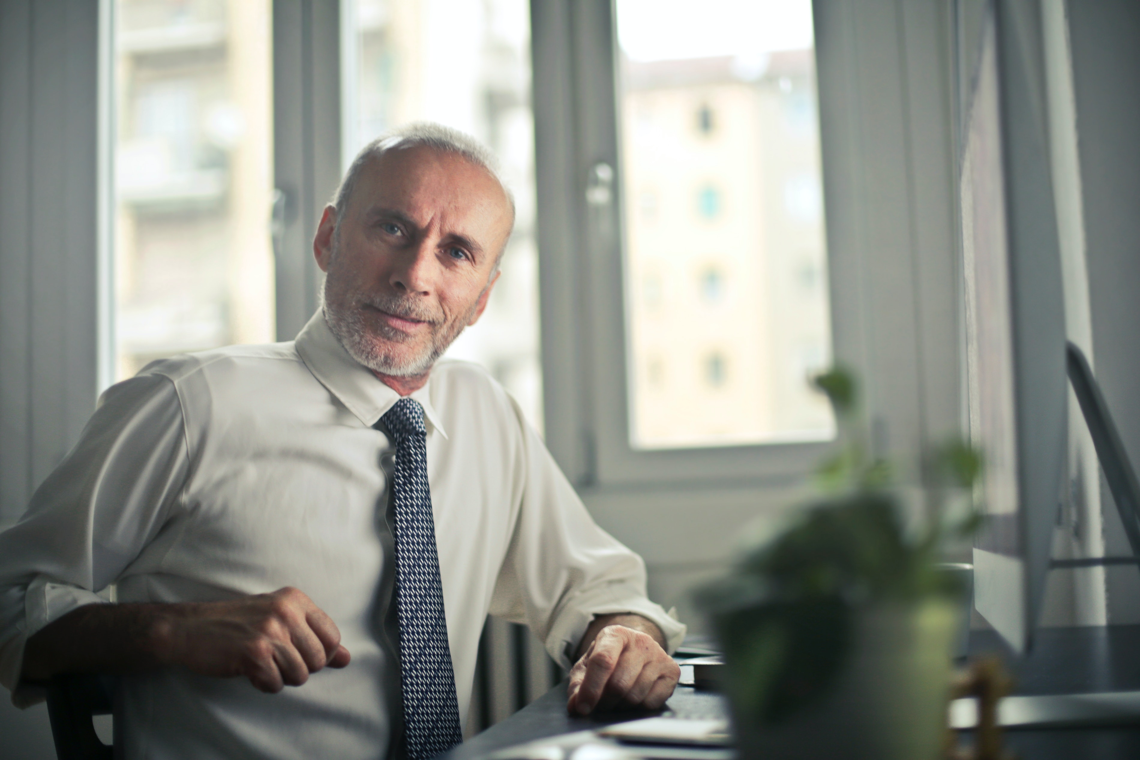 Smiling man at desk