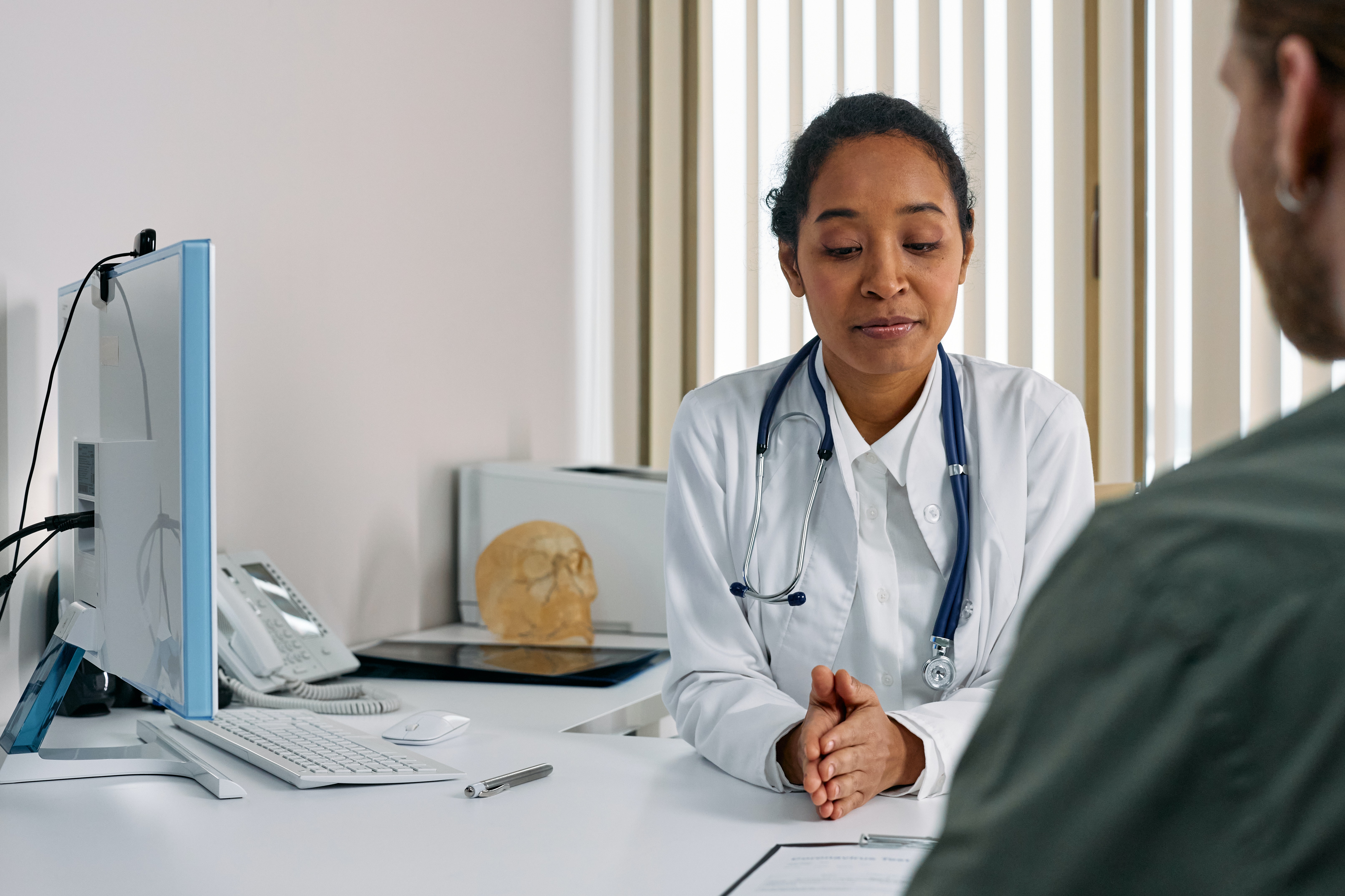 Doctor at desk during consultation
